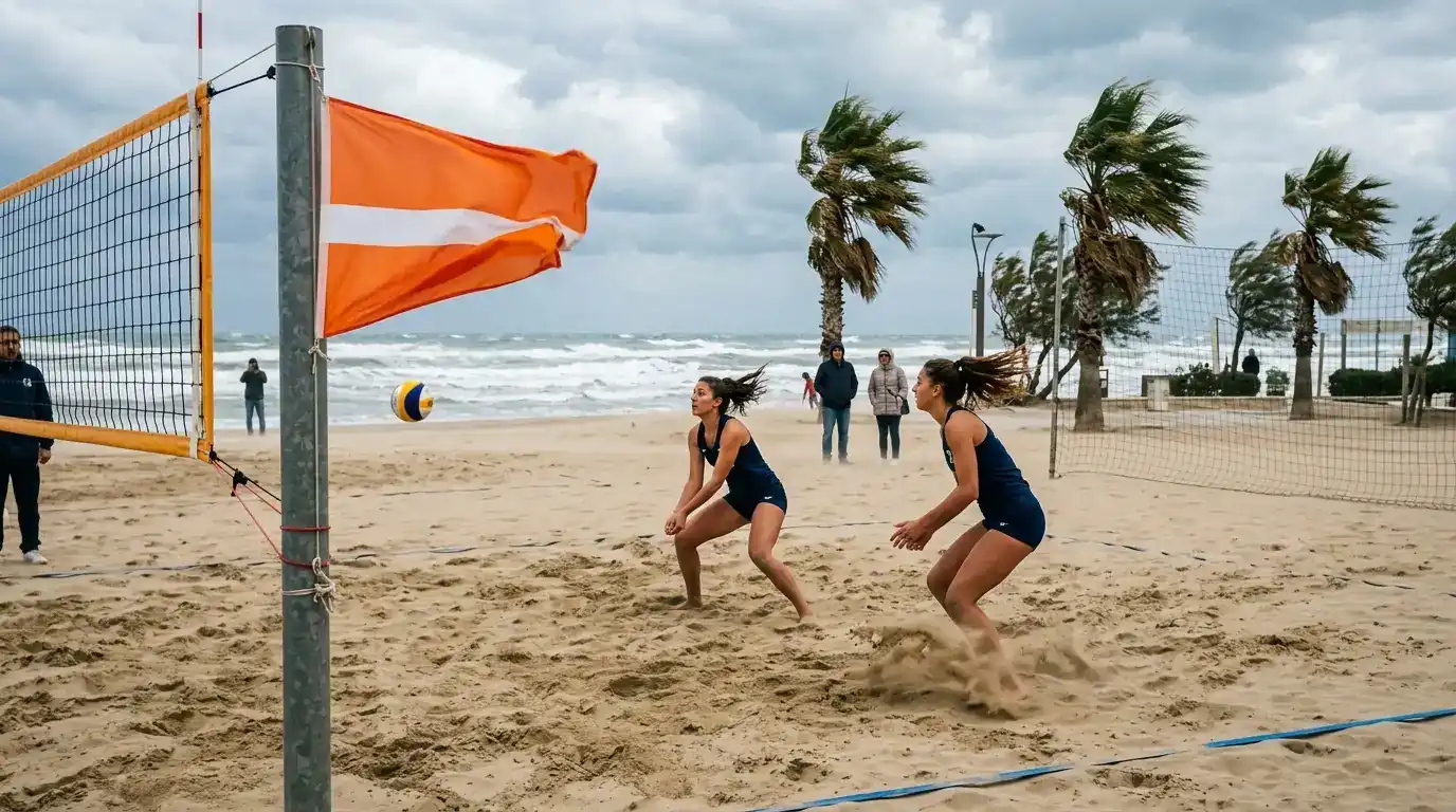Bandierina mossa dal vento accanto a un campo di beach volley, effetto sui punti totali